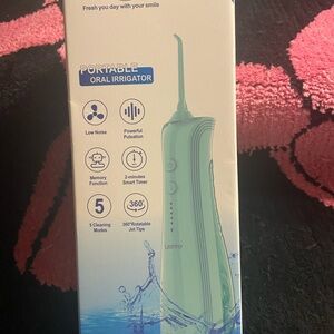 Mint Green 💋💋💋 SOLD 💋💋💋Dental Hygiene Device with Versatile Features